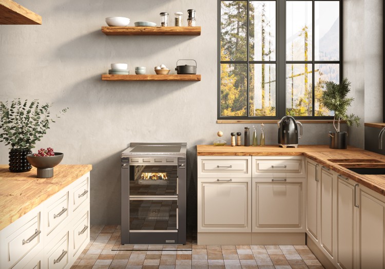 photo ambiance cuisinière à bois Cook'R 60 de Morvan, puissance de 7,5 kW et rendement de 81,2 %. Disponible en trois finitions (blanc, anthracite, et bordeaux), avec plaque de cuisson en acier poli et four spacieux de 40 L. Compacte (60 cm de largeur), elle est idéale pour les cuisines intégrées et offre un chauffage d’appoint performant avec un charme rustique.